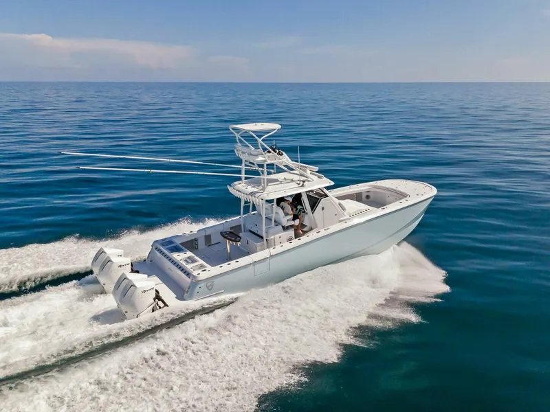 Slide: The Image of 2023 Barker Boatworks 40 HPC cruising on open water. - 38