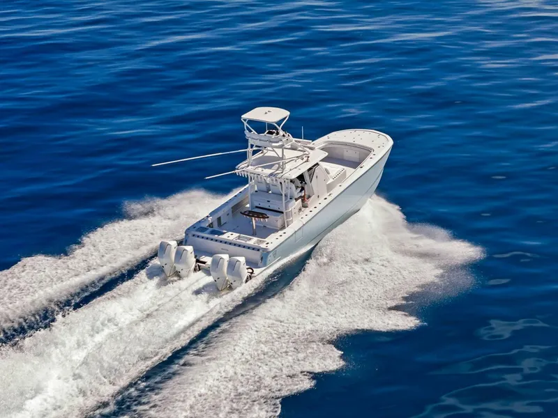 Slide: The Image of 2023 Barker Boatworks 40 HPC cruising on open water. - 40