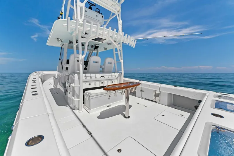 Slide: The Image of 2023 Barker Boatworks 40 HPC, spacious deck, luxury fishing boat on open water. - 17