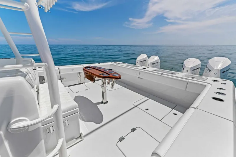 Slide: The Image of 2023 Barker Boatworks 40 HPC, spacious deck, ocean view, four outboard engines. - 5