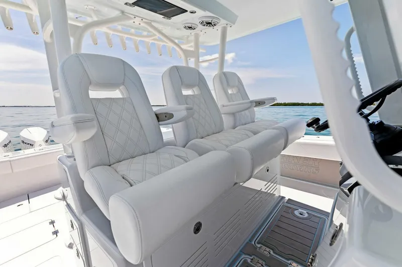 Slide: The Image of 2023 Barker Boatworks 40 HPC interior with luxurious seating and ocean view. - 8