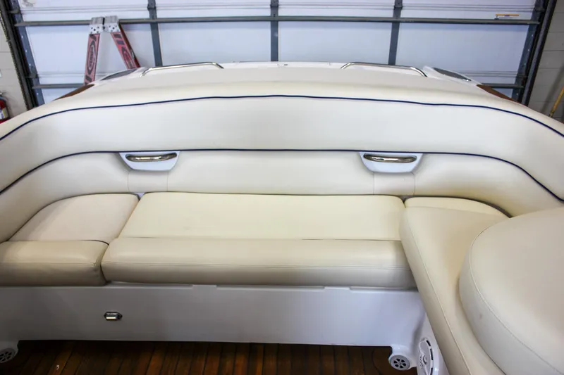 Slide: The Image of 2004 Chris-Craft 28 LAUNCH boat interior with white leather seating. - 36