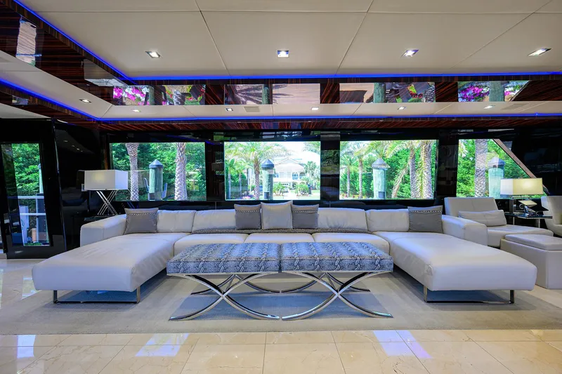 Slide: The Image of Luxurious interior of 1997 Broward 108 Raised Pilothouse yacht with modern furnishings. - 26