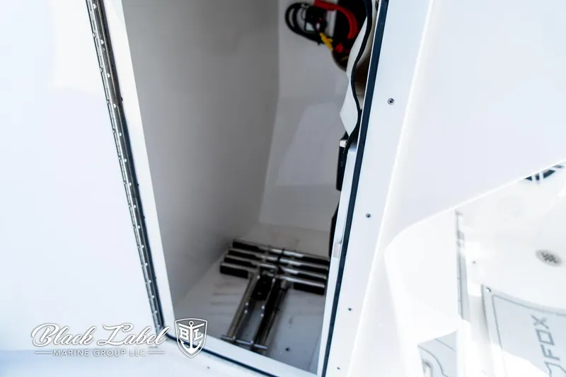 Slide: The Image of 2024 Sea Fox 288 Traveler Dual Console storage compartment detail. - 12