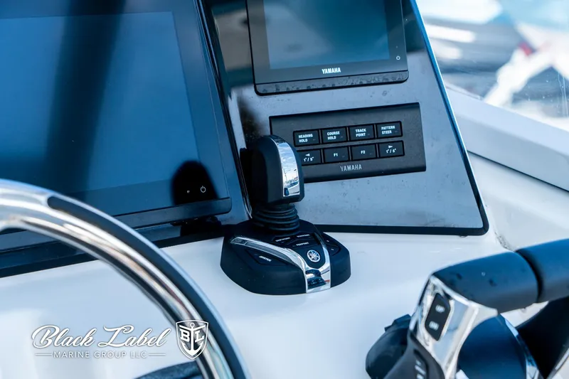 Slide: The Image of 2024 Sea Fox 288 Traveler Dual Console dashboard with Yamaha controls and displays. - 22
