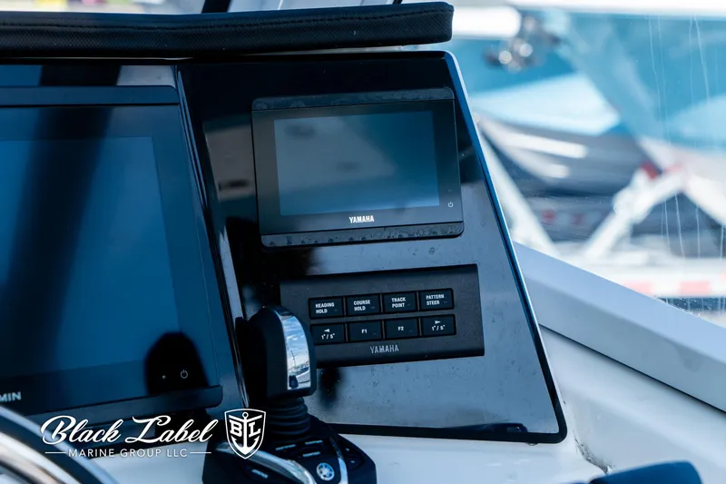 Slide: The Image of 2024 Sea Fox 288 Traveler Dual Console dashboard with Yamaha controls and Black Label Marine branding. - 23
