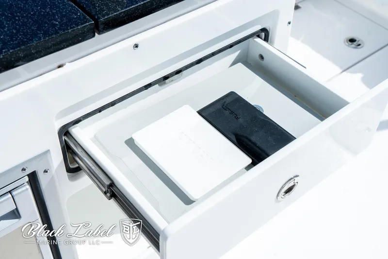Slide: The Image of Open storage drawer on 2024 Sea Fox 288 Traveler Dual Console boat. - 27