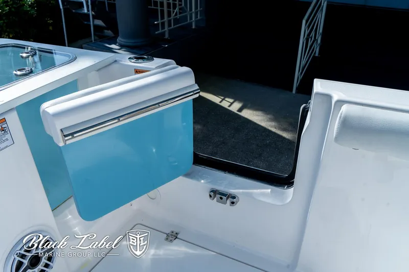 Slide: The Image of 2024 Sea Fox 288 Traveler Dual Console boat with open storage compartment. - 31