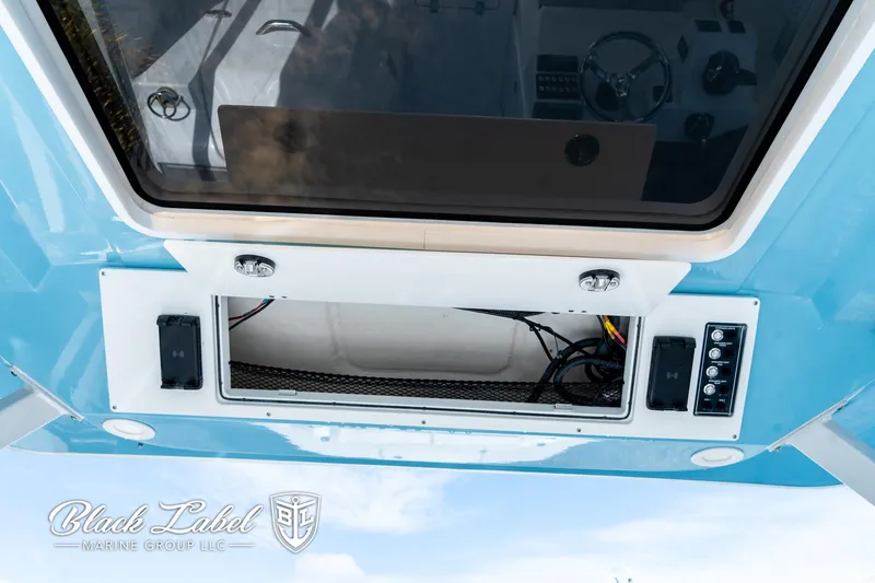 Slide: The Image of 2024 Sea Fox 288 Traveler Dual Console boat interior with control panel. - 38