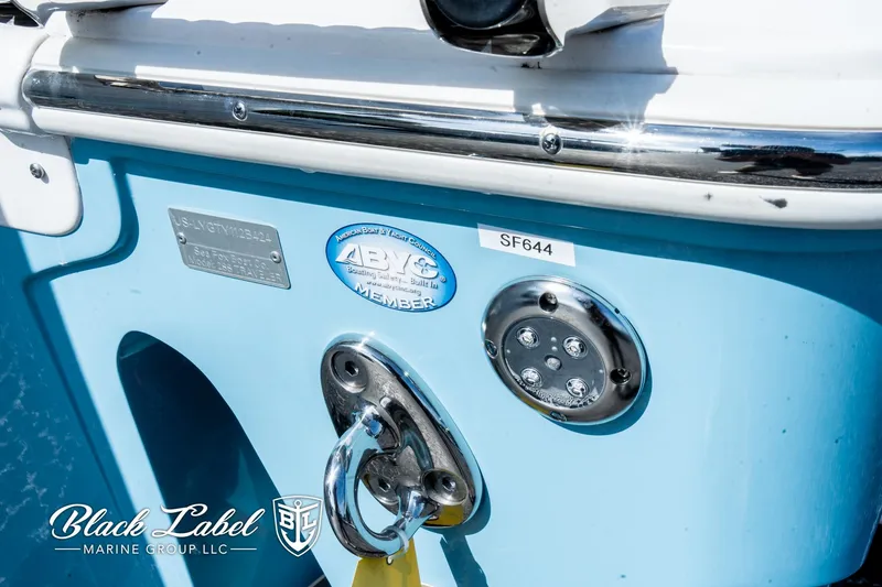 Slide: The Image of 2024 Sea Fox 288 Traveler Dual Console, blue hull, featuring ABYC member badge and Black Label Marine Group logo. - 4