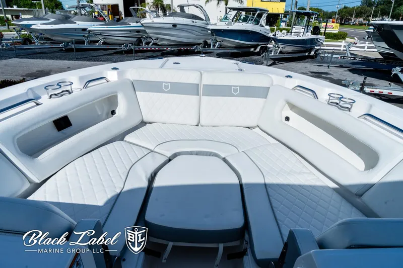 Slide: The Image of 2024 Sea Fox 288 Traveler Dual Console boat interior with luxurious seating. - 7