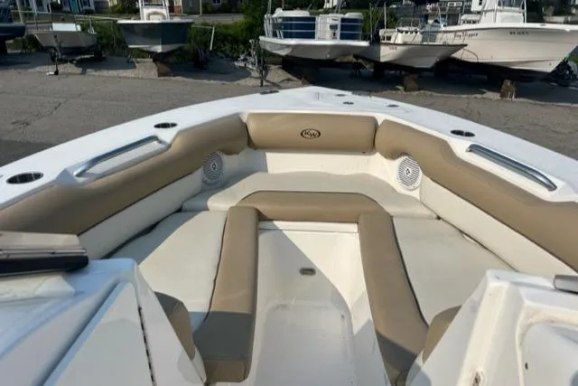 Slide: The Image of 2020 Key West 239 DFS boat interior with cushioned seating. - 5