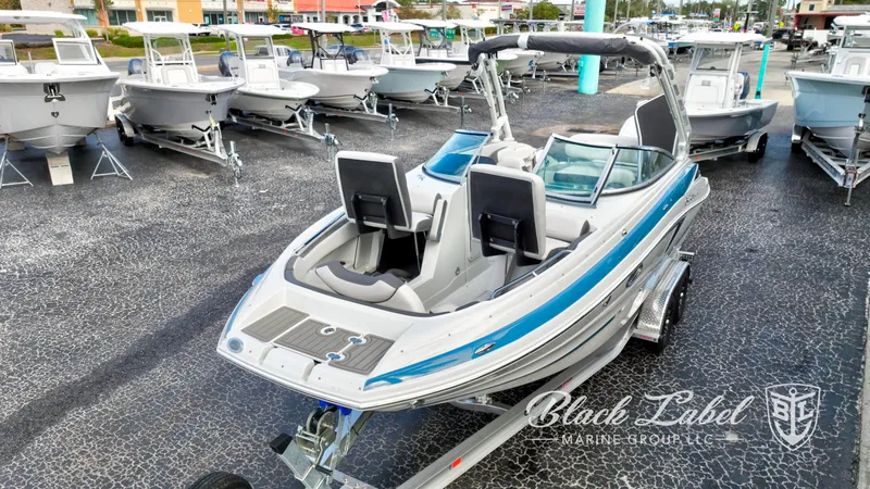 Slide: The Image of 2024 Crownline E260 XS boat displayed at Black Label Marine Group. - 8
