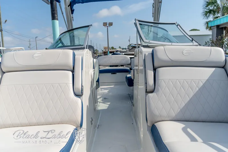 Slide: The Image of 2024 Crownline E260 XS boat interior with luxurious seating and modern design. - 12
