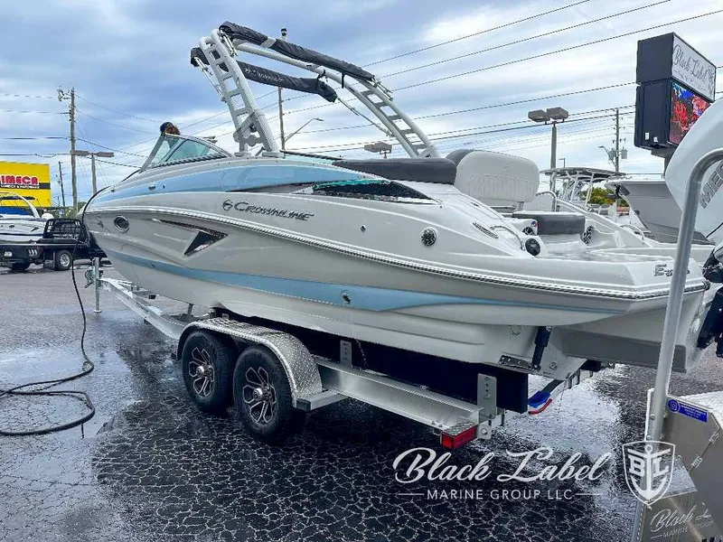 Slide: The Image of 2024 Crownline E280 XS boat on trailer at Black Label Marine Group. - 10