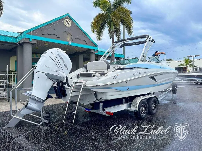 Slide: The Image of 2024 Crownline E280 XS boat on trailer at Black Label Marine Group. - 11