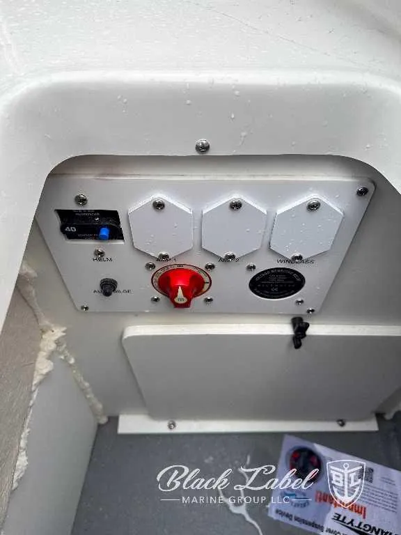 Slide: The Image of Control panel of a 2024 Crownline E280 XS boat by Black Label Marine Group. - 6