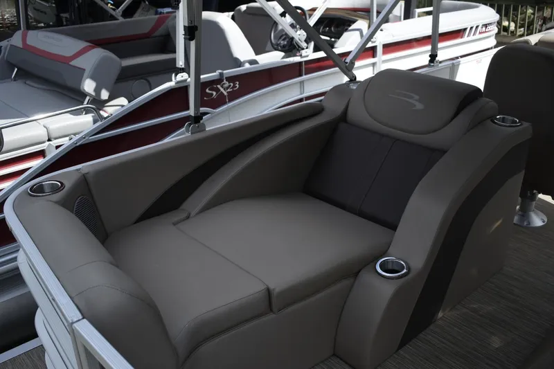 Slide: The Image of Luxurious seating on a 2023 Bennington 22 SXCW pontoon boat. - 14