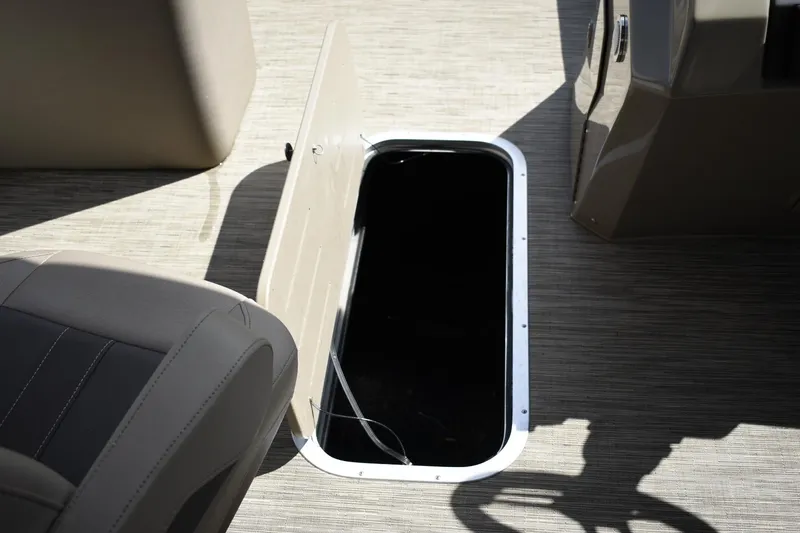 Slide: The Image of 2023 Bennington 22 SXCW boat storage compartment. - 15