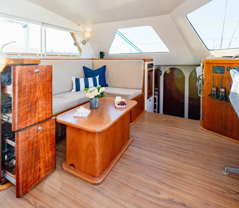 Slide: The Image of Luxurious interior of 2009 Chris White Atlantic 57 catamaran with elegant wood finish. - 11