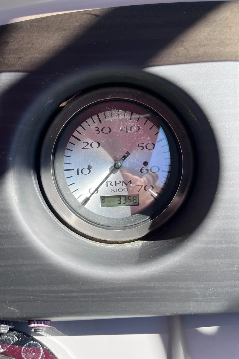 Slide: The Image of Tachometer of 2023 Bennington 23 SXSB showing RPM reading. - 11
