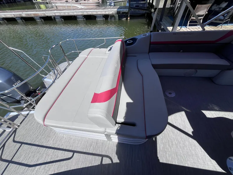 Slide: The Image of 2023 Bennington 23 SXSB pontoon boat with spacious seating and modern design. - 6
