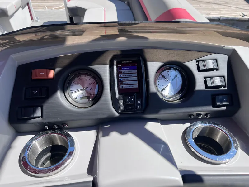 Slide: The Image of Dashboard of 2023 Bennington 23 SXSB boat with gauges and controls. - 9
