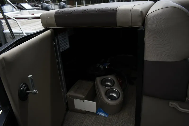 Slide: The Image of Interior storage compartment of 2023 Bennington 23 XSL3 pontoon boat. - 12