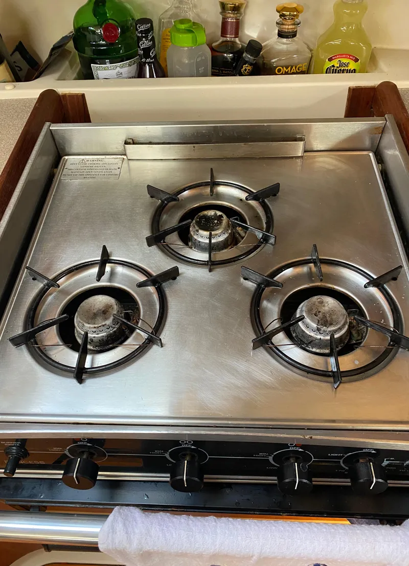 Slide: The Image of Three-burner stainless steel stove on a 1997 Hunter 430 yacht. - 17