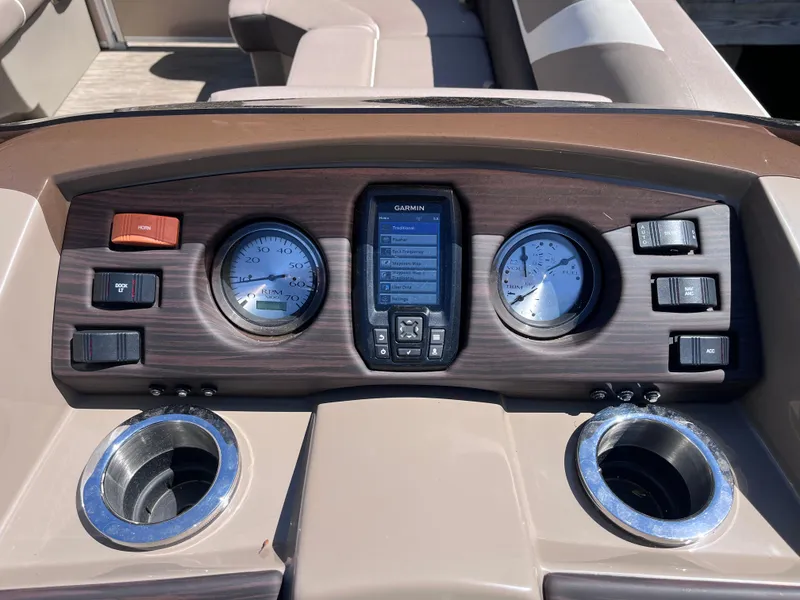 Slide: The Image of Dashboard of 2023 Bennington 22 SXSR boat with gauges and controls. - 6
