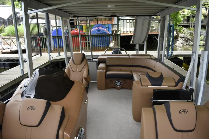 Slide: The Image of 2024 Avalon Catalina Funship 25' interior with luxurious seating and modern design. - 13