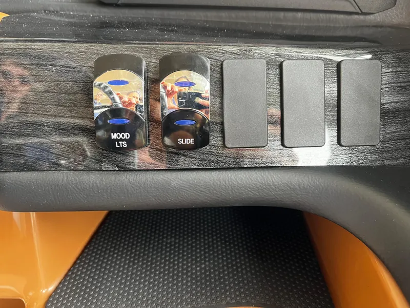 Slide: The Image of Control panel of 2024 Avalon Catalina Funship 25' with mood lights and slide switches. - 21