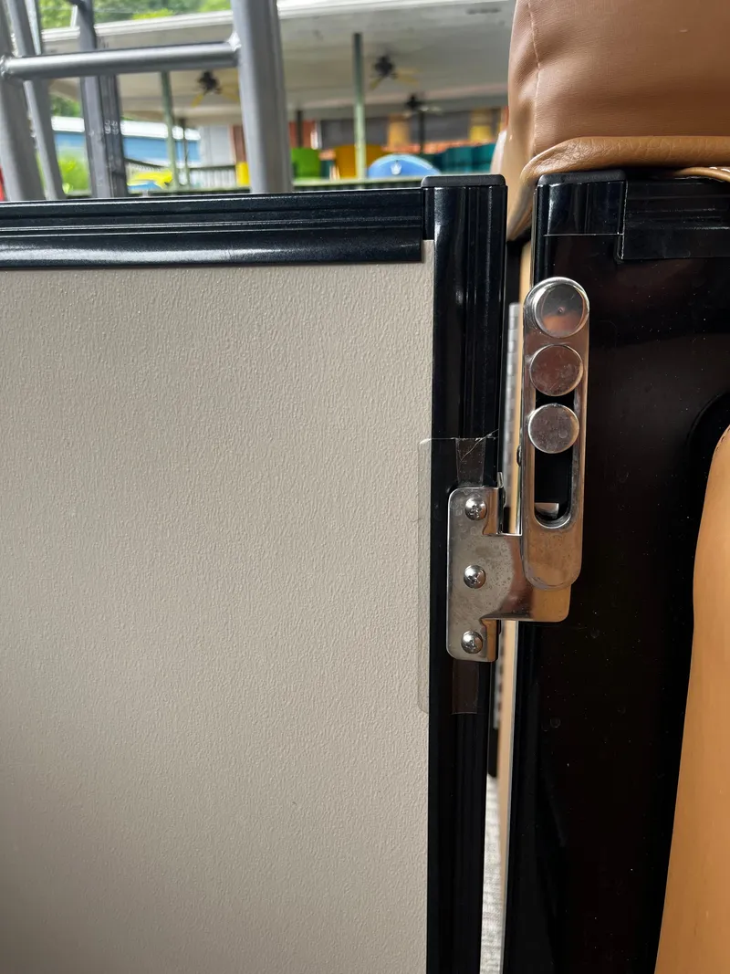 Slide: The Image of Close-up of 2024 Avalon Catalina Funship 25' boat seat hinge and latch. - 37