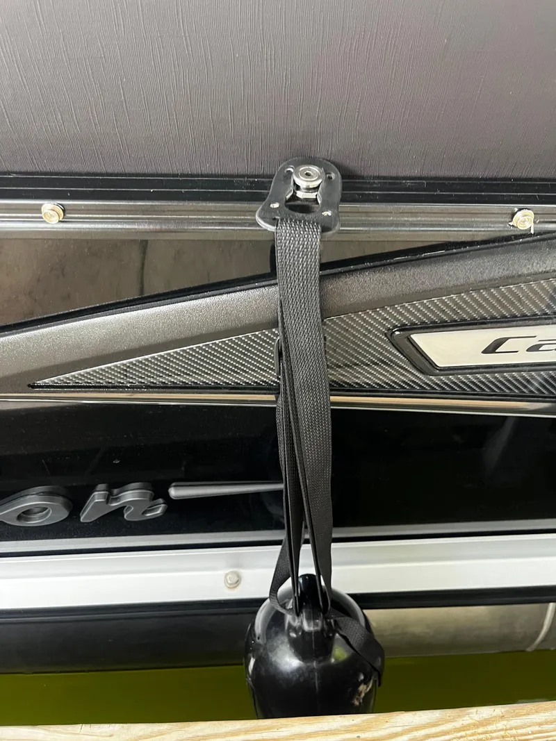 Slide: The Image of 2024 Avalon Catalina Funship 25' boat detail with black strap and fender. - 41