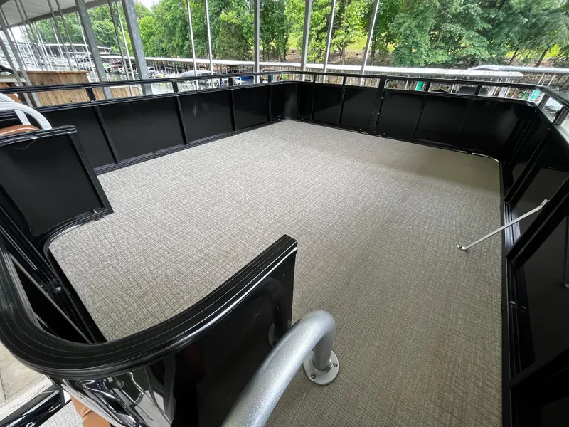 Slide: The Image of Upper deck of 2024 Avalon Catalina Funship 25' pontoon boat with carpeted flooring. - 44