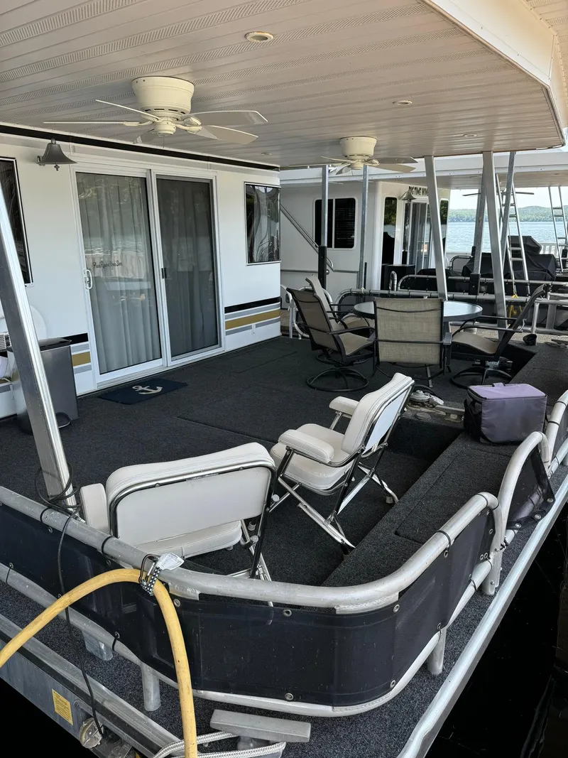 Slide: The Image of 2003 Sharpe 75' Houseboat with spacious deck and outdoor seating. - 1