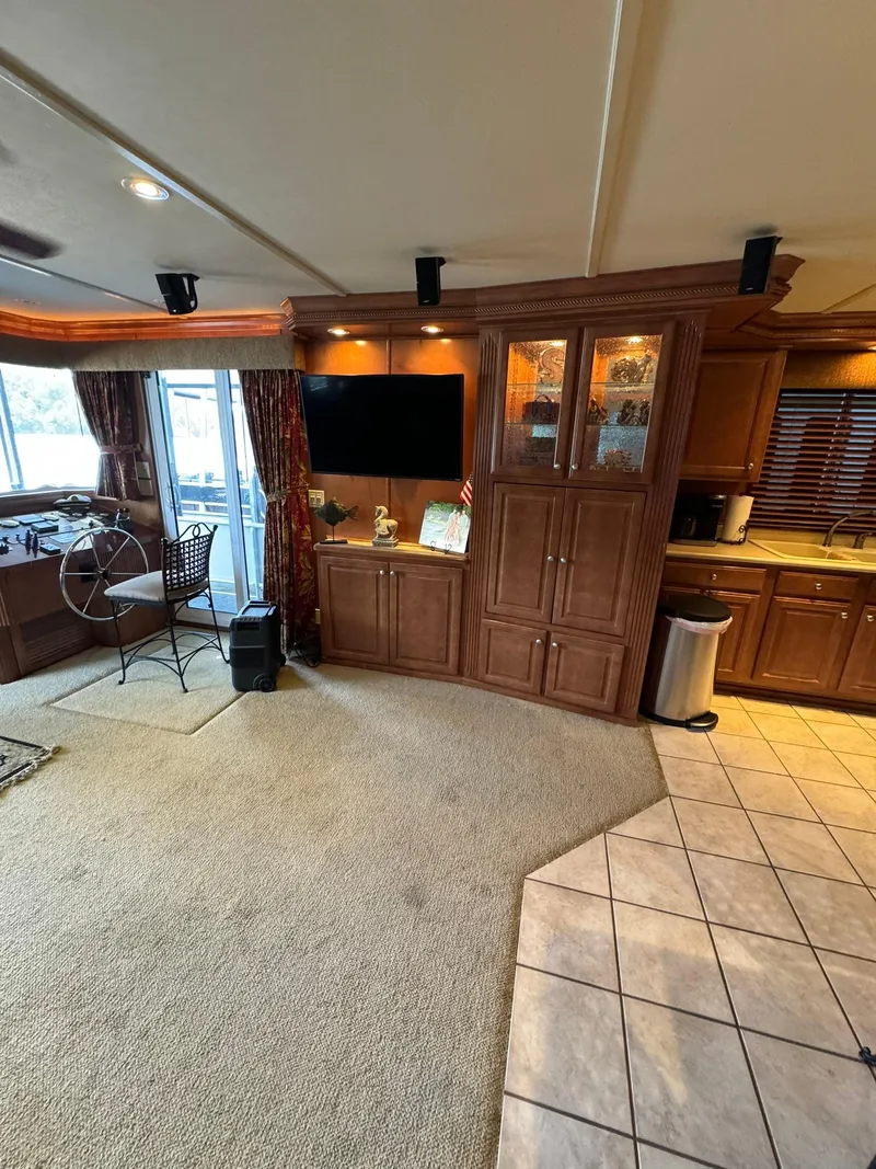 Slide: The Image of Interior of 2003 Sharpe 75' Houseboat with kitchen and living area. - 22