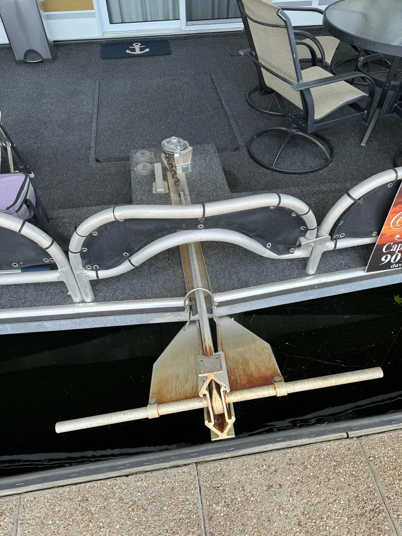 Slide: The Image of 2003 Sharpe 75' Houseboat with anchor and outdoor seating area. - 3