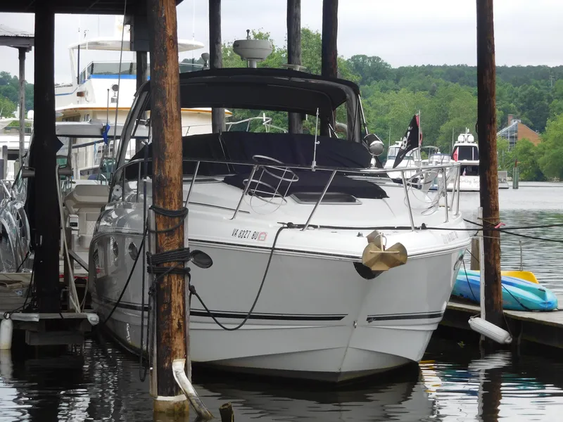 Slide: The Image of 2006 Chaparral 350 Signature boat docked at a marina. - 1