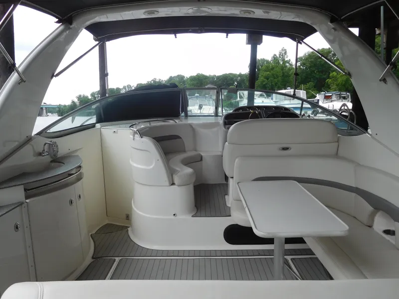 Slide: The Image of 2006 Chaparral 350 Signature boat interior with seating and table. - 10
