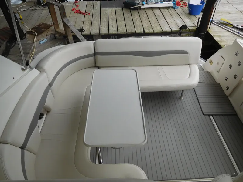 Slide: The Image of 2006 Chaparral 350 Signature boat interior with seating and table. - 12
