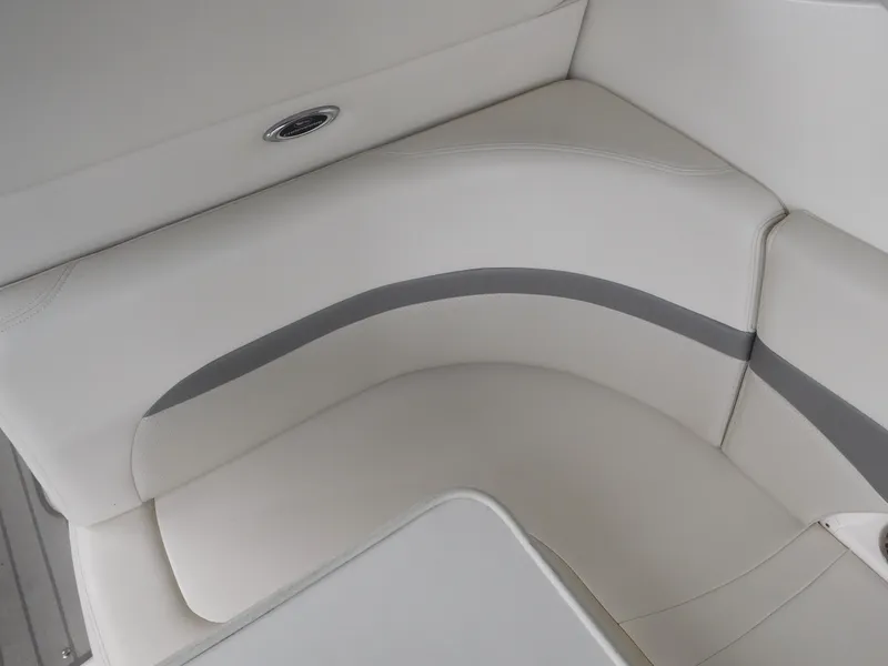 Slide: The Image of 2006 Chaparral 350 Signature boat interior seating, white and gray upholstery. - 18