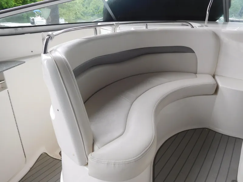 Slide: The Image of 2006 Chaparral 350 Signature boat interior with curved white seating. - 19