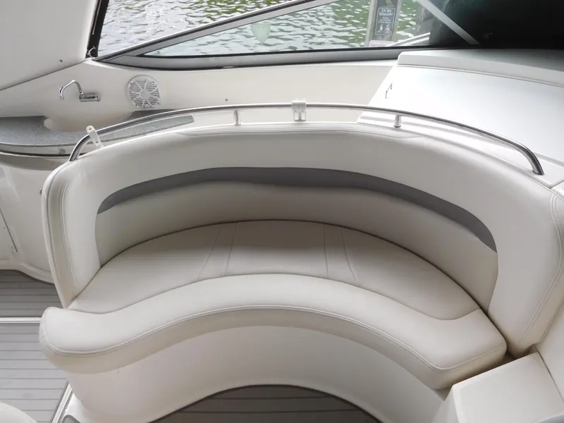 Slide: The Image of 2006 Chaparral 350 Signature boat interior seating area with white leather upholstery. - 20