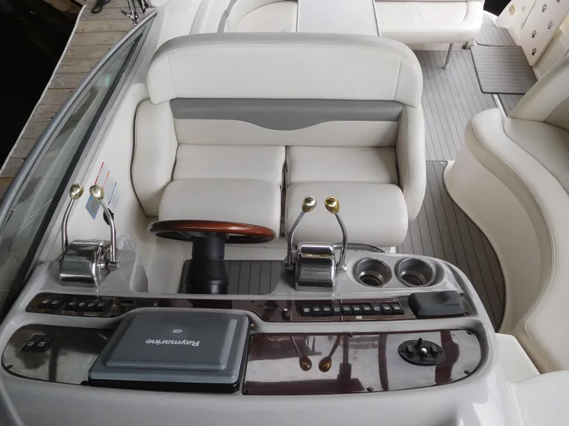 Slide: The Image of 2006 Chaparral 350 Signature boat helm with dual controls and leather seating. - 22