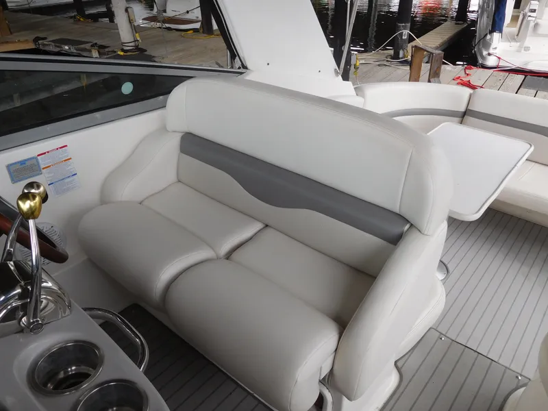 Slide: The Image of 2006 Chaparral 350 Signature boat interior with white and gray seating. - 23