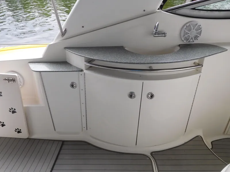 Slide: The Image of 2006 Chaparral 350 Signature boat interior with storage cabinets and countertop. - 30