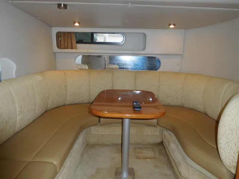 Slide: The Image of 2006 Chaparral 350 Signature interior with U-shaped seating and table. - 37
