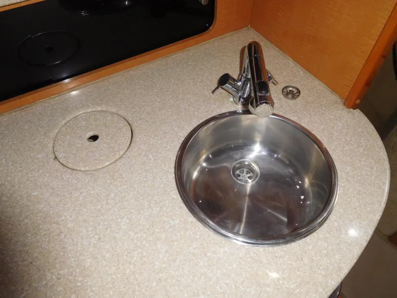 Slide: The Image of 2006 Chaparral 350 Signature boat kitchen sink and countertop - 49