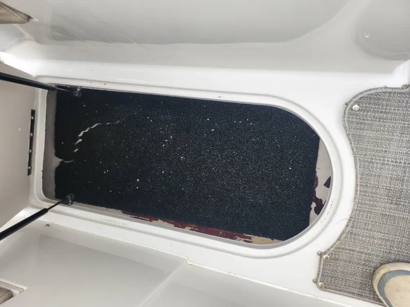 Slide: The Image of Storage compartment of a 2015 Starcraft Crossover 210 SCX IO boat. - 20